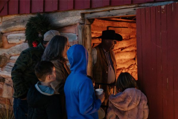 A family peers inside the Matador Half-Dugout.