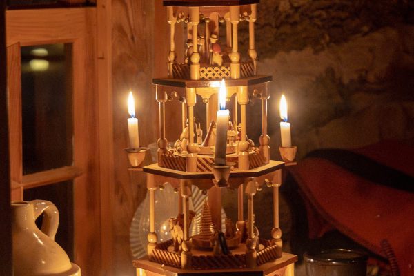 German Christmas carousels, or Weihnachtspyramiden (Christmas pyramids), are traditional wooden, tiered decorations from the Erzgebirge region that spin via convection heat from candles.