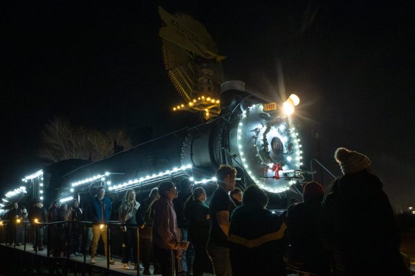 1923 Baldwin Locomotive adorned with Christmas lights and a wreath.