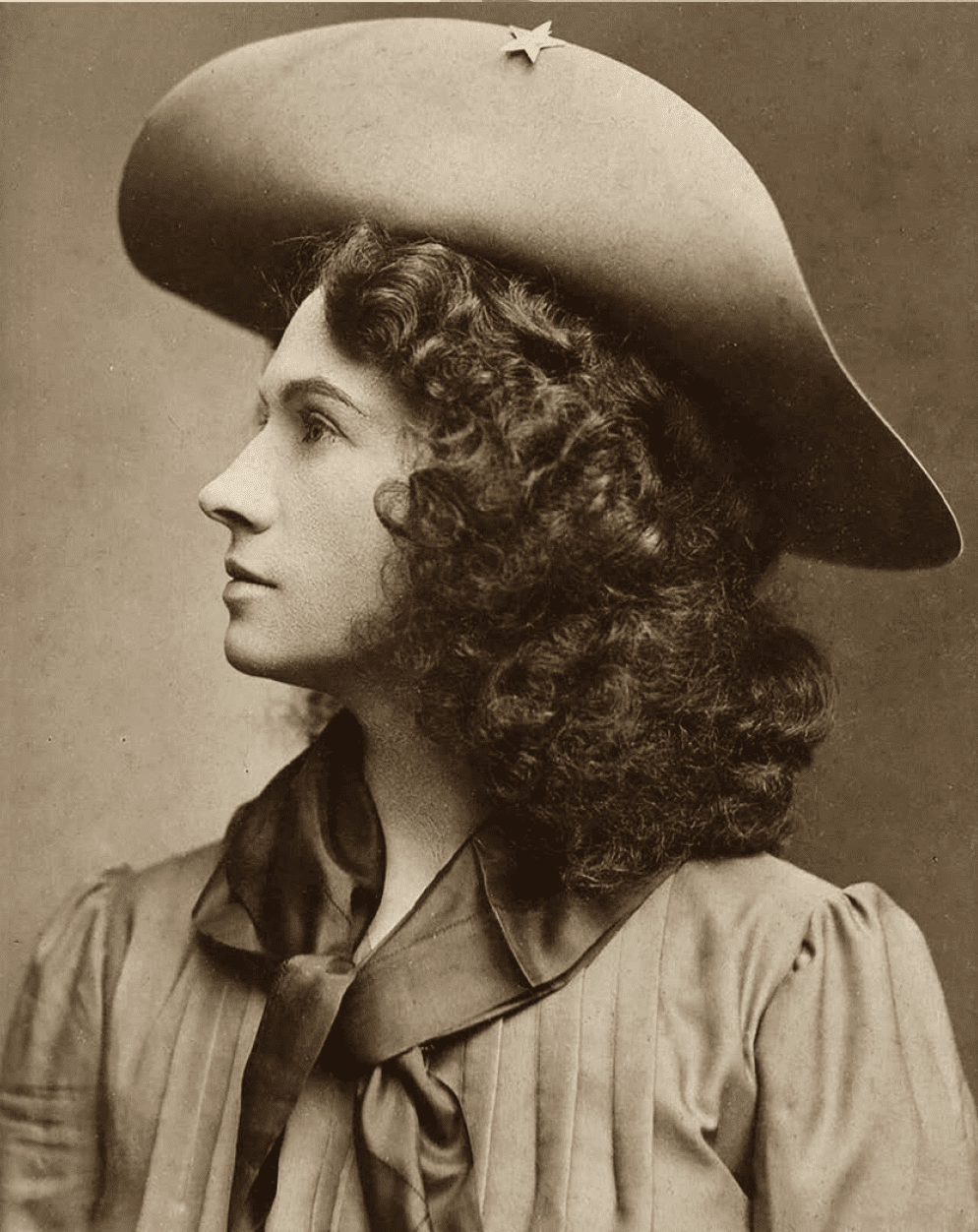 Portrait of Annie Oakley's side profile.